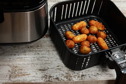 Air fryer basket should be placed properly