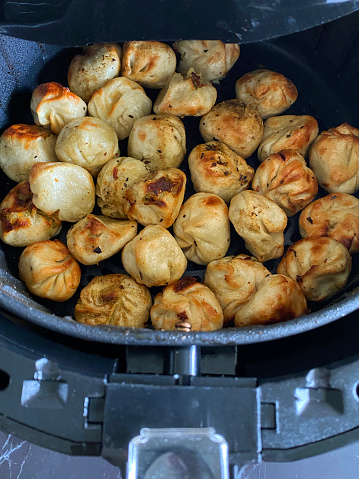 Dumplings cooked in an air fryer