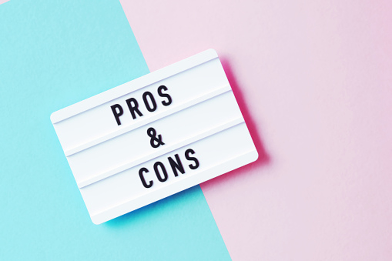 a digital image of pros and cons with split background color