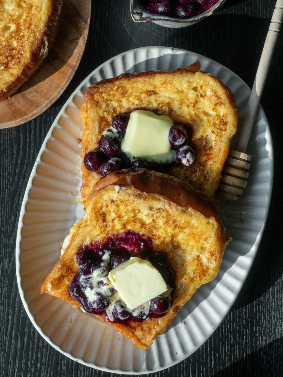 A crispy bread toast with jam and butter