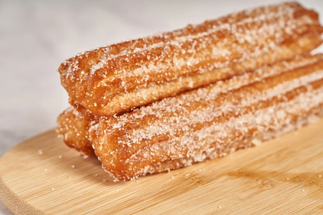 churros on a wooden board