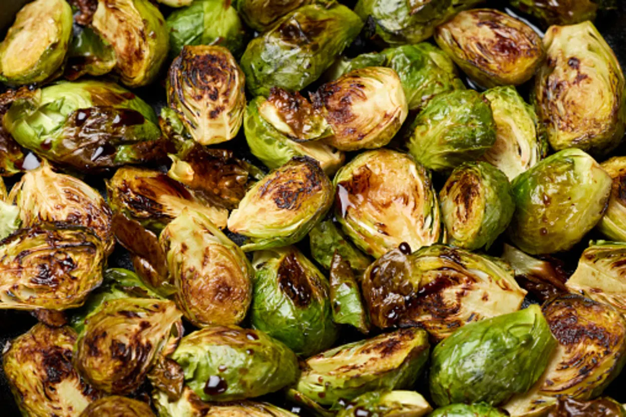 cast iron pan containing brussels sprouts