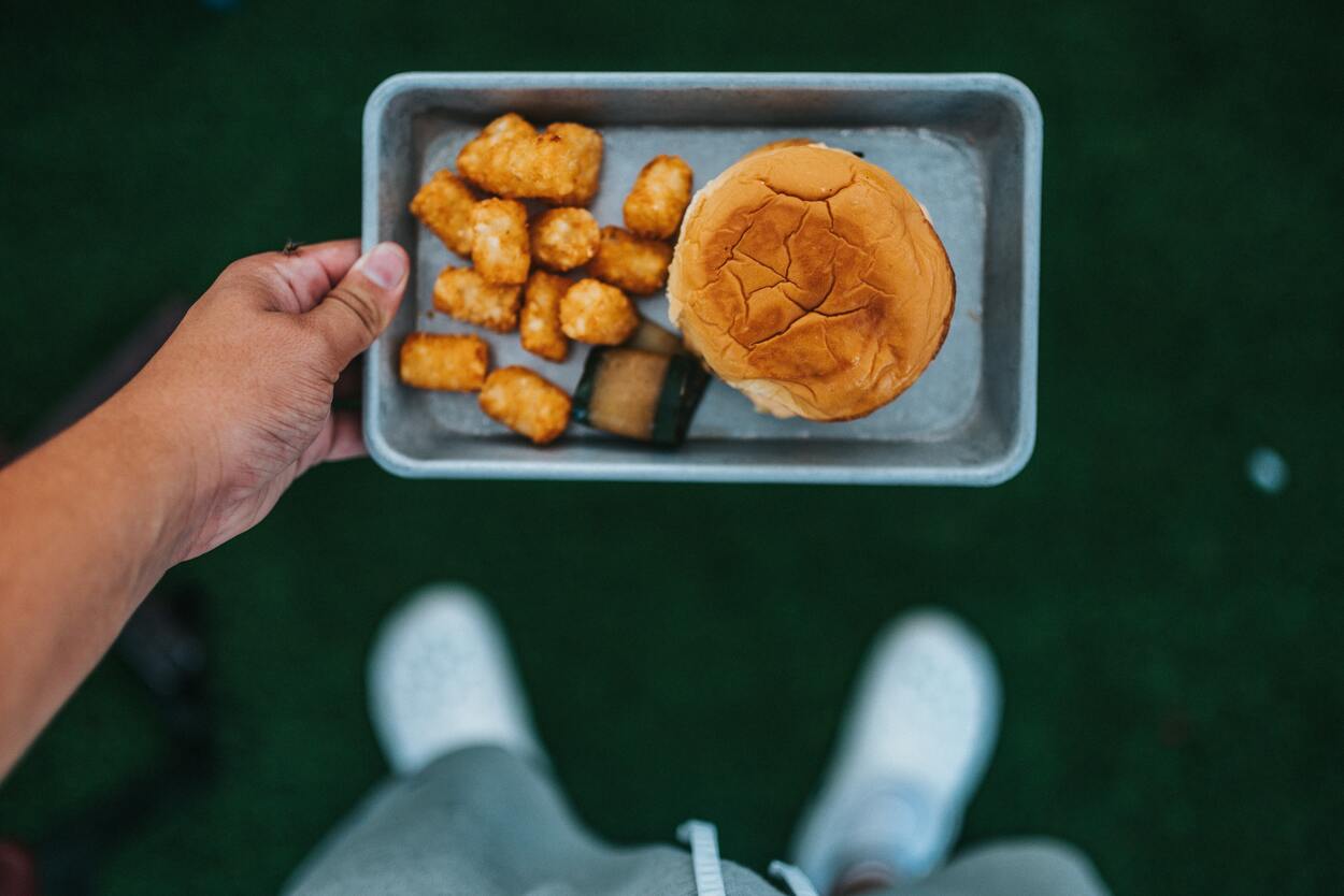Tater tots served with a bun.