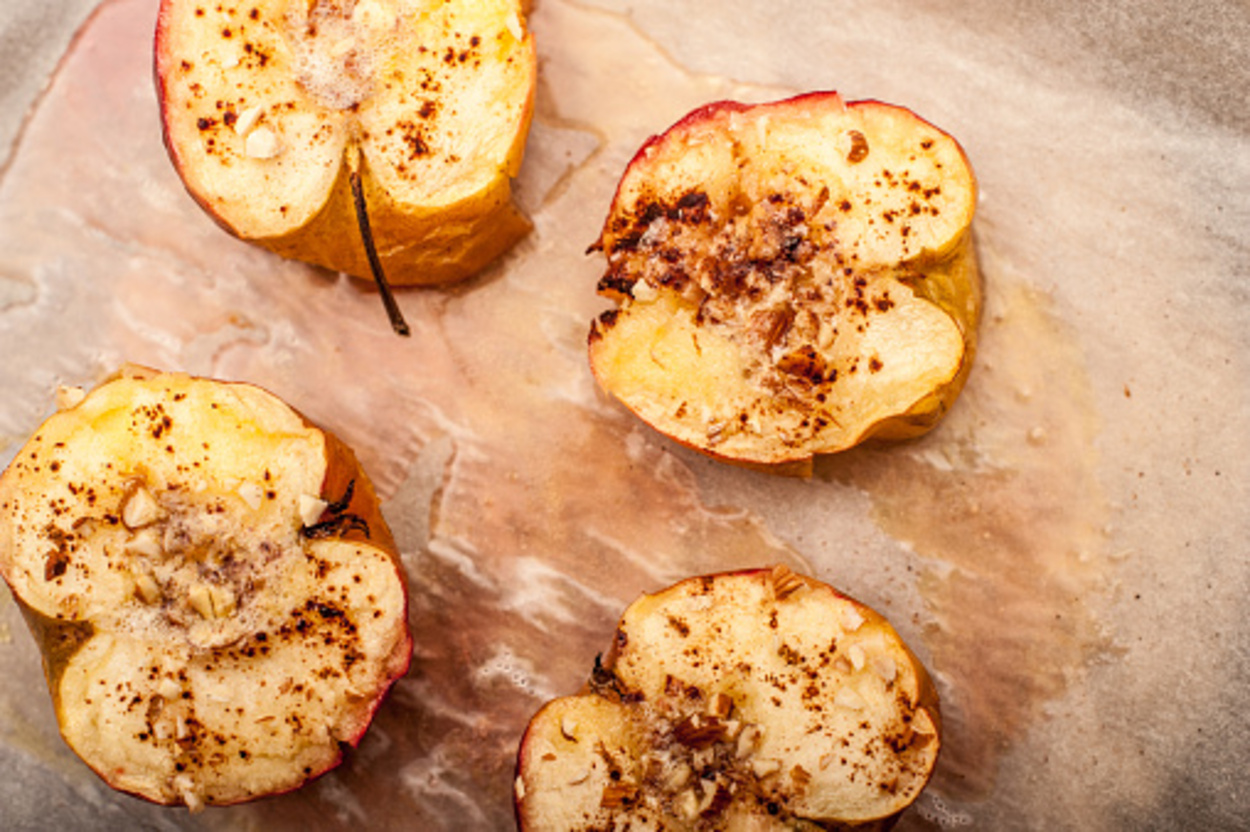 Baked apples placed on baking sheet