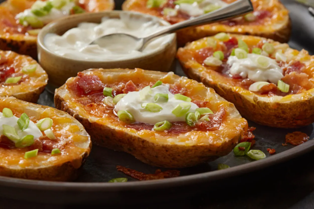 Loaded Potato Skins with Cheddar Cheese.