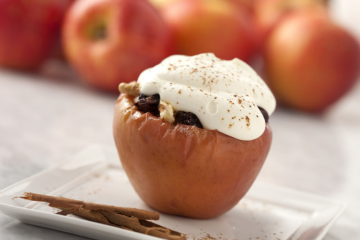 Baked apple stuffed with raisins and walnuts.