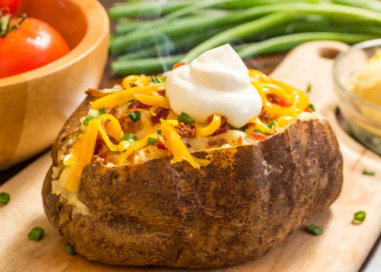 Baked potato with cheese and sour cream