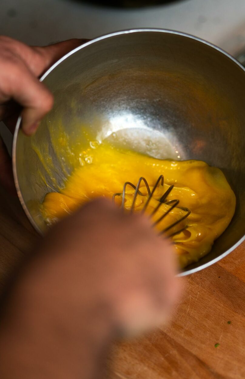 Whisking egg in a bowl