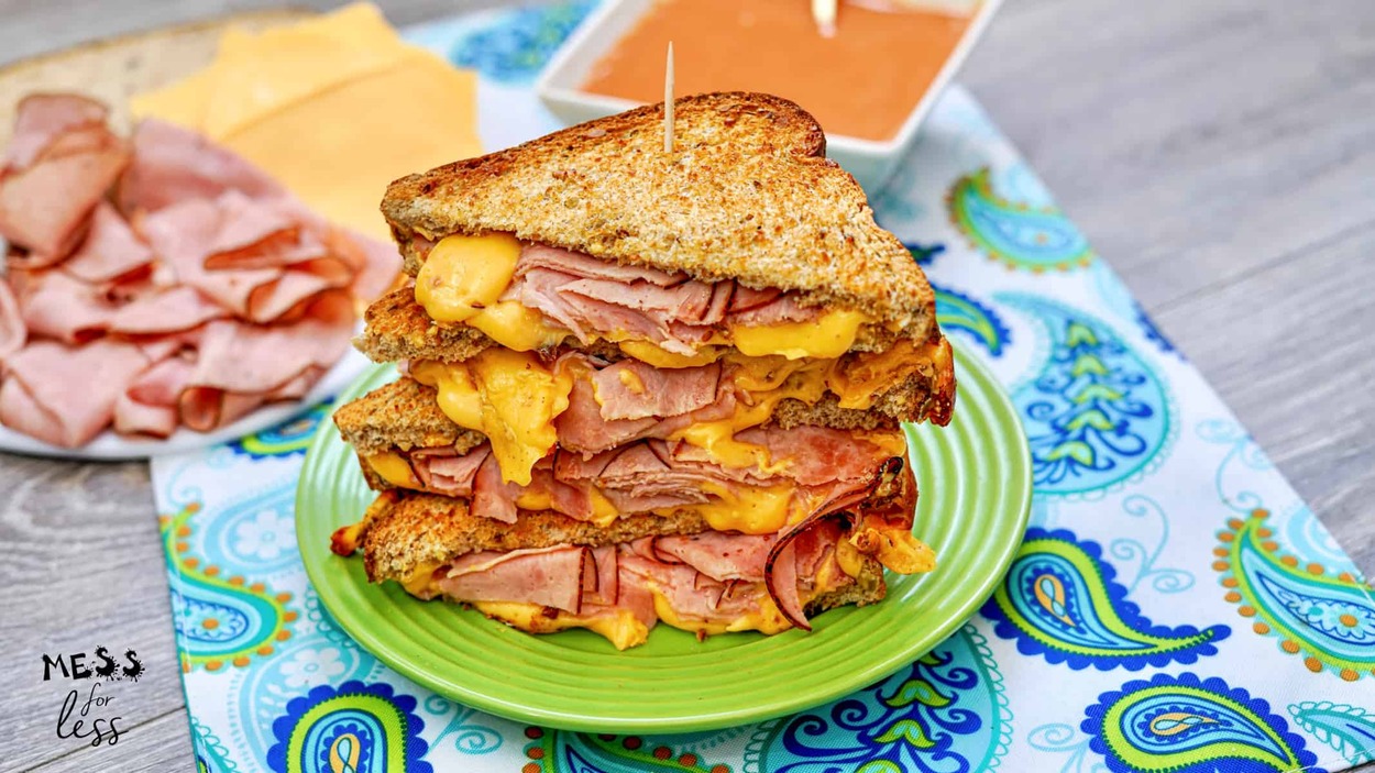 Sandwiches stacked on a round plate