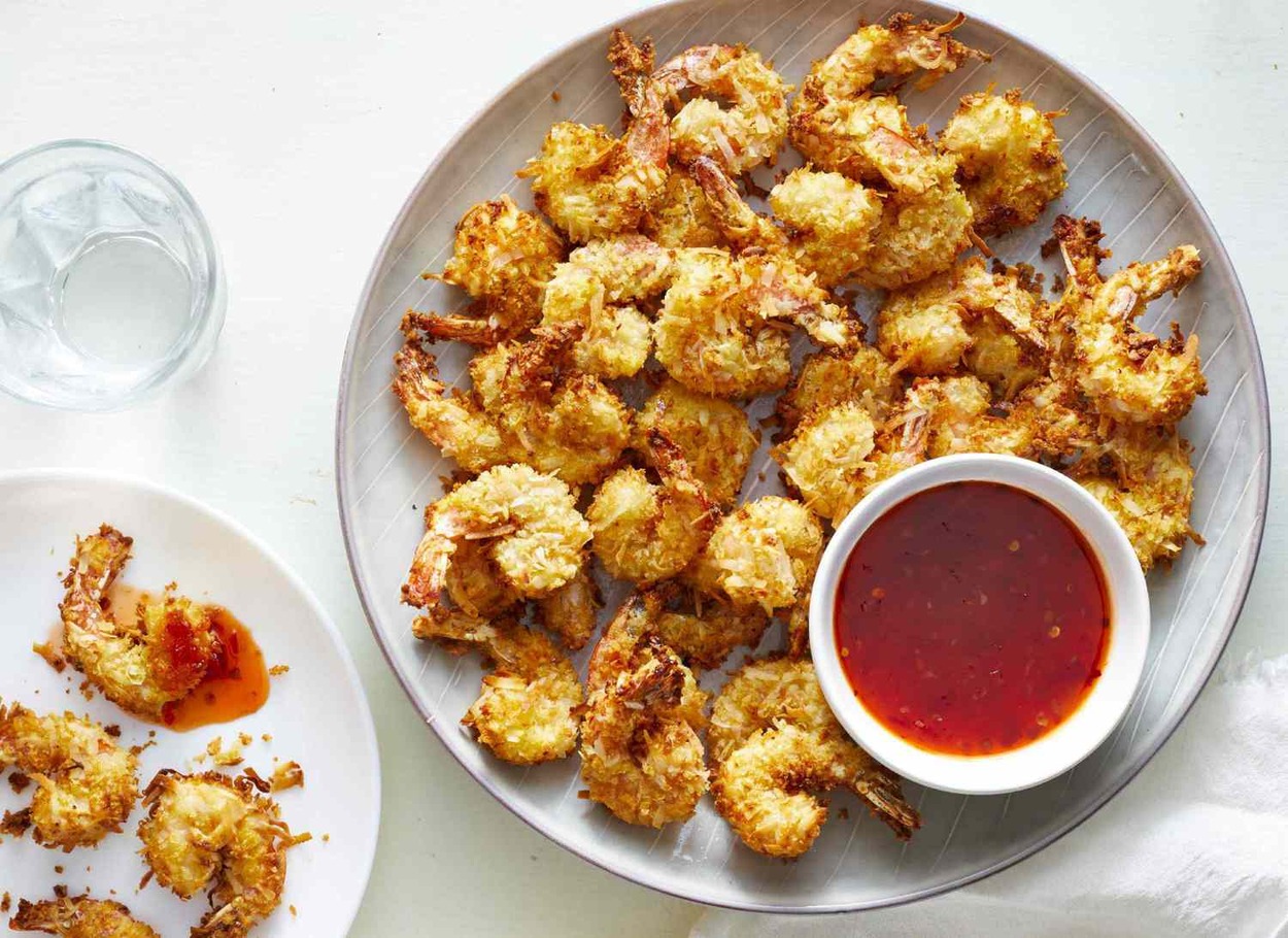 You can use a dipping sauce of your choice with air fryer coconut shrimp