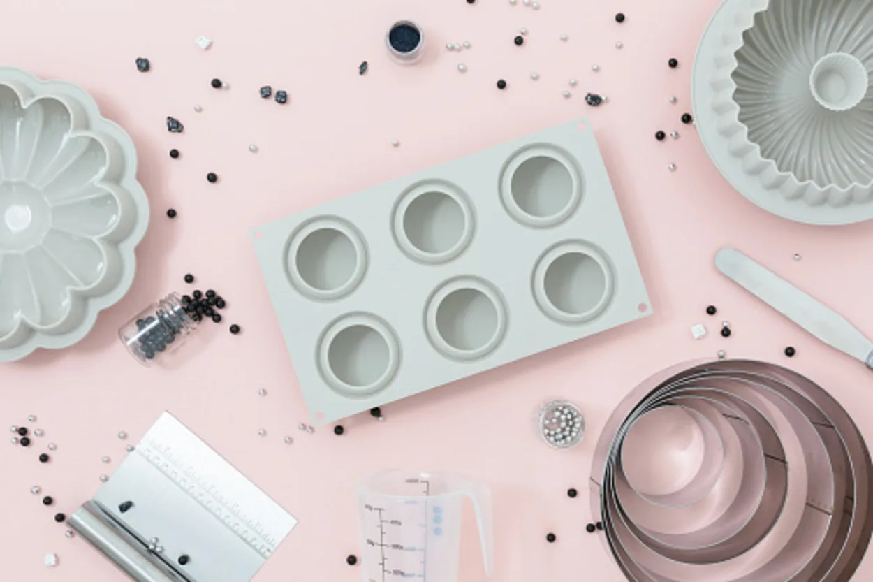 Top view of a silicone pan with other baking accessories