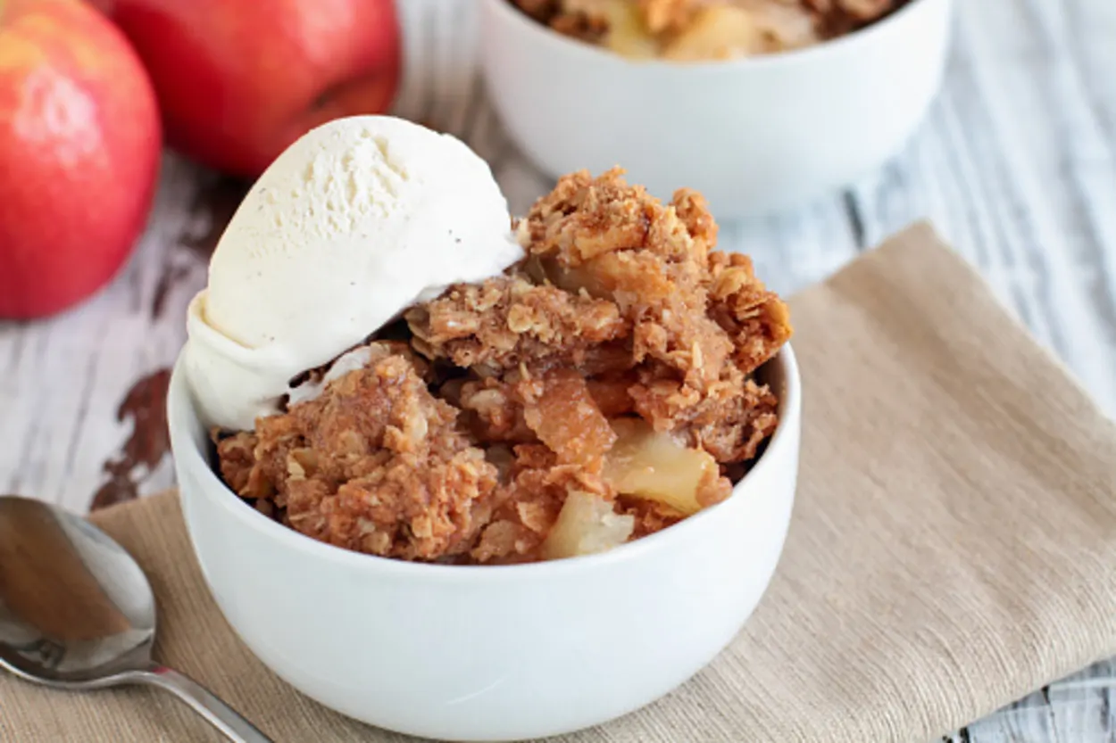 Apple crumble served with streusel