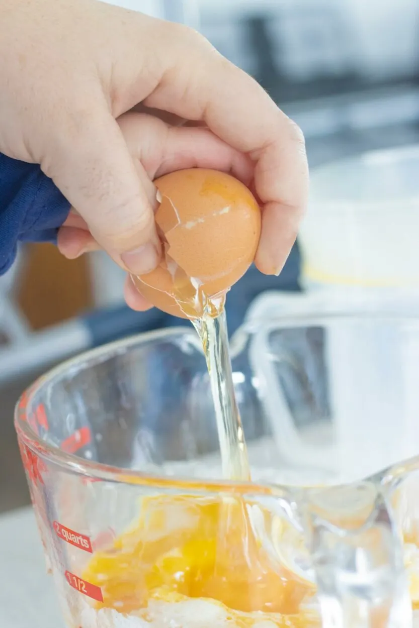 Egg being cracked in a bowl