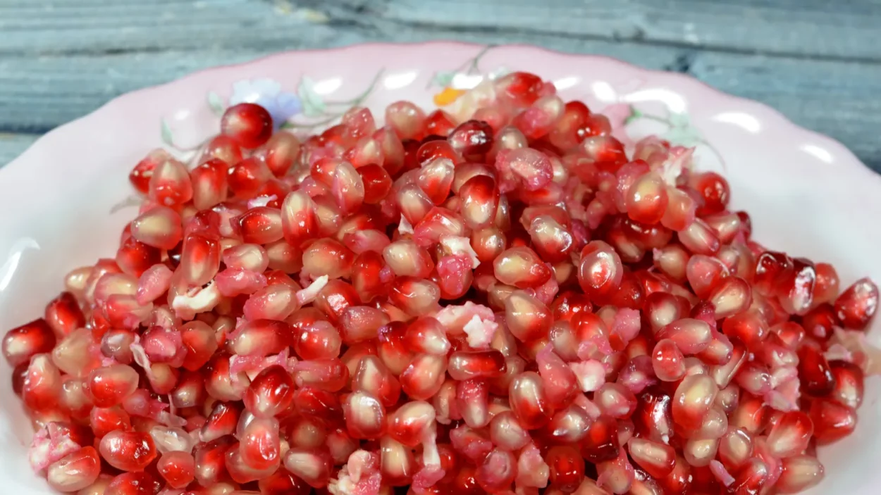 the pomegranate punica granatum a fruitbearing deciduous shrub in the