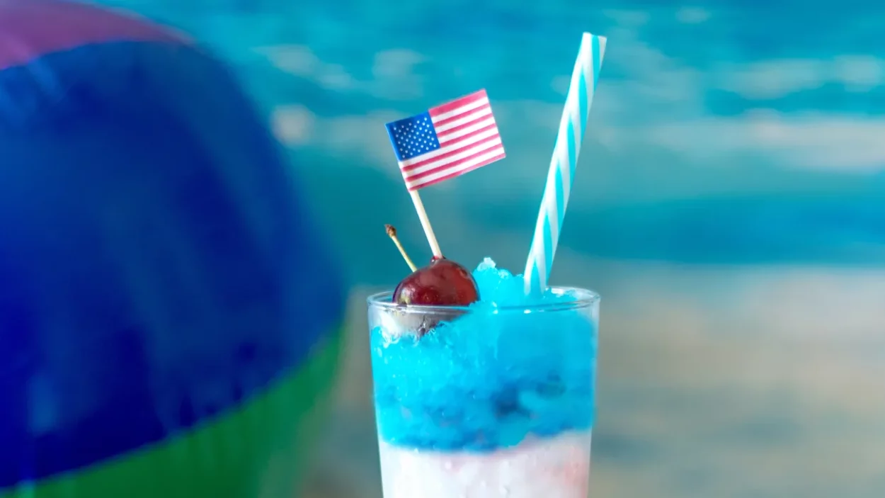 red white and blue vodka lemonade slush with an american