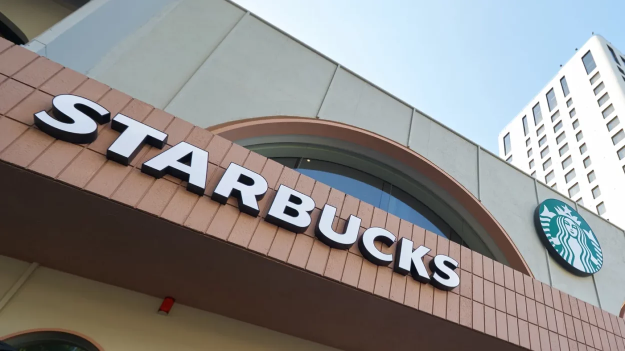 Starbucks sign over coffee shop entrance in Ho Chi Minh City.