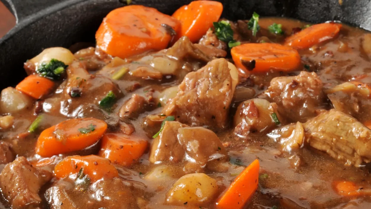 gourmet beef stew served in a cast iron skillet
