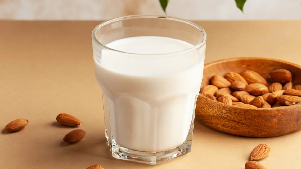 Vegetable almond vegan milk in a glass.