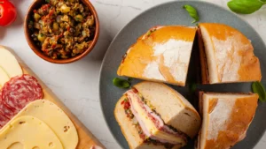 muffuletta sandwich with cheese ham and olive paste a traditional