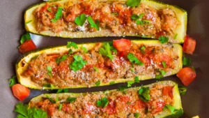 grilled stuffed zucchini with vegetables and herbs